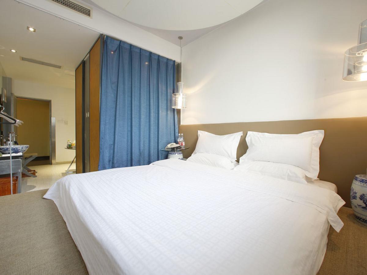 China Community Art Habitat Hotel Qingdao Oda fotoğraf